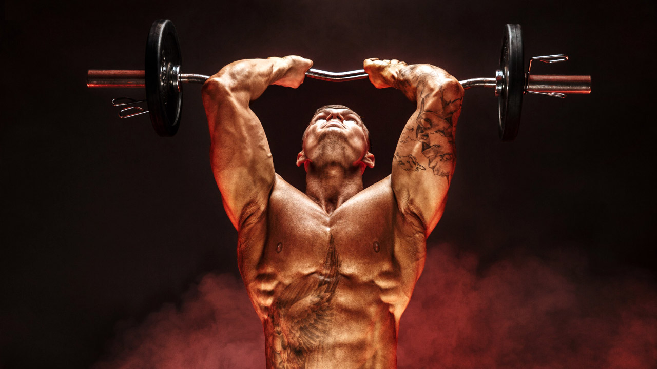 Top 10 bodybuilding supplements for beginners banner featuring a bodybuilder lifting barbells above his head